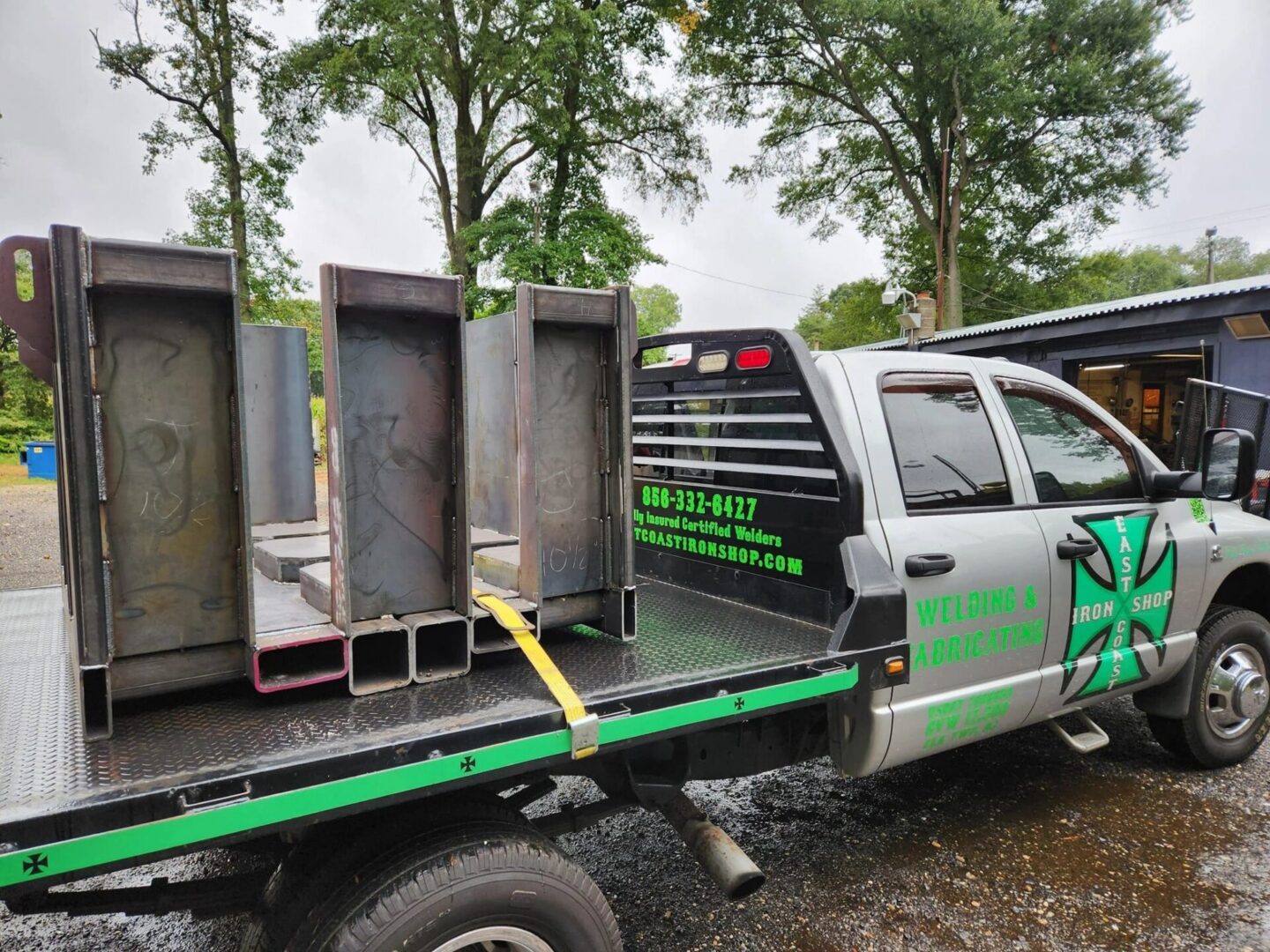 Steel beams secured on flatbed truck