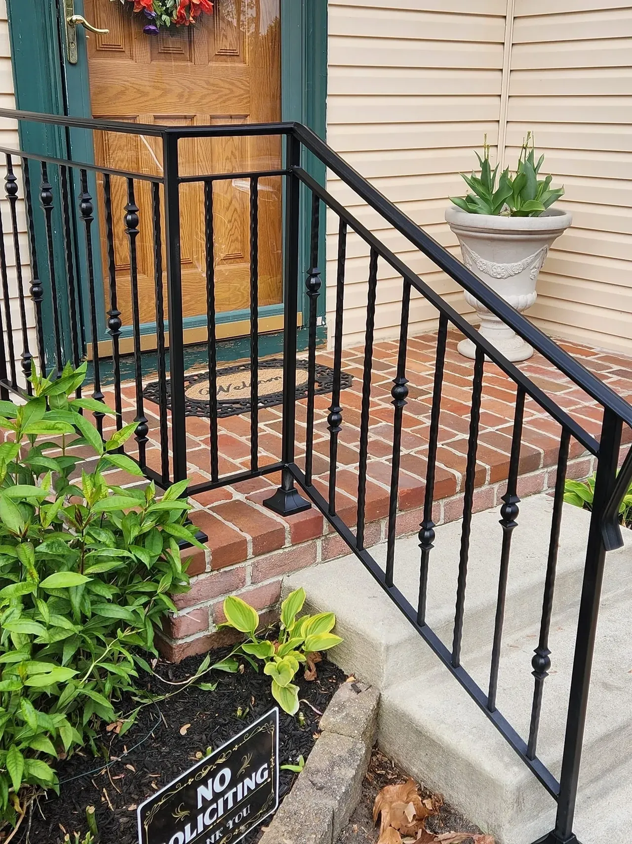 No soliciting sign near entrance stairs